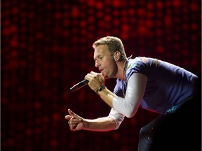 Coldplay's lead singer Chris Martin on stage during a concert for A Head Full of Dreams Tour at BC Place, Vancouver, September 29 2017.