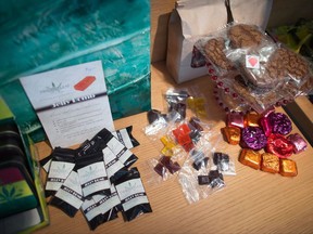 Edible marijuana products are displayed for sale at a Weeds Glass & Gifts medical marijuana dispensary in downtown Vancouver on May 1, 2015. A new survey suggests a large majority of Canadians support the legalization of recreational marijuana use, with many expressing a cautious willingness to try eating pot-infused munchies. THE CANADIAN PRESS/Darryl Dyck