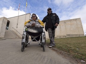 Marlene Bird, left, and Patrick Lavallee stand outside of the Prince Albert Provincial court following the sentencing decision of Leslie Black, in Prince Albert, Sask., on Friday, Sept. 22, 2017.