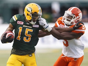 B.C. Lions defensive back Buddy Jackson gets in the grill — literally — of Edmonton Eskimos wide receiver Vidal Hazelton carrying the ball during a July 28 CFL game at Commonwealth Stadium in Edmonton.