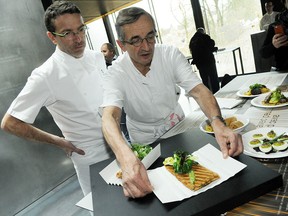 French chefs Sébastien Bras, left, and his father Michel are pictured. Sébastien has renounced his three Michelin stars.