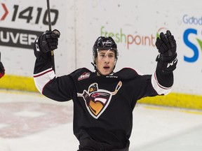 Owen Hardy of the Vancouver Giants celebrates after scoring a goal against the Portland Winterhawks during the first period of their WHL game at the Langley Events Centre on Dec. 16, 2016.