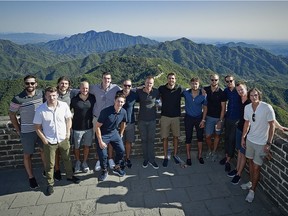 Players with the Vancouver Canucks pose for a group photo while climbing the Great Wall of China September 22, 2017 in Beijing, China. The Vancouver Canucks and the LA Kings were playing two pre-season games in China this week.