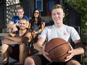Phil Weston, a project manager on the new Teck Acute Care Centre at B.C. Children's Hospital (back left), with his wife, Jewel, and sons Grason (holding basketball) and Philip.