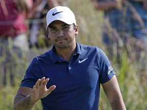 Jason Day waves to the crowd after he made a birdie putt on the third hole during the second round of the BMW Championship golf tournament at Conway Farms Golf Club, Friday, Sept. 15, 2017, in Lake Forest, Ill. (AP Photo/Nam Y. Huh)