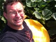Passionate Port Kells giant pumpkin aficionado Maurizio Camparmo taking a selfie with his 786 lb. giant pumpkin.
