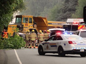 A dump truck rolled away from a work site and hit multiple vehicles on Lougheed Highway between Pitt River and Orchid in Coquitlam around 4:30 p.m. Tuesday, Sept. 5, 2017. There was one reported fatality and several others were taken to hospital. [PNG Merlin Archive]
Shane MacKichan, for PNG, PNG