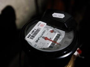 This file photo shows a residential water meter. A new report from the Ecofiscal Commission recommends that municipalities rely on multi-rate user fees to recover costs and encourage conservation.