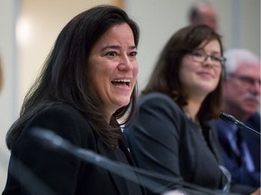 Federal Justice Jody Wilson-Raybould (left) and Alberta Justice Minister Kathleen Ganley at the start of a meeting of federal, provincial and territorial ministers responsible for justice and public safety, in Vancouver, on Thursday, Sept. 14, 2017.