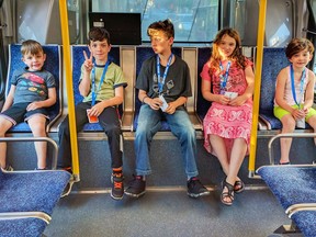 Adrian Crook's children ride a bus in Vancouver.