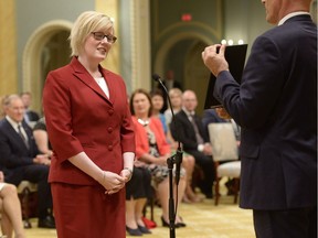 Carla Qualtrough is sworn in as Minister of Public Works and Procurement during a ceremony at Rideau Hall in Ottawa on Aug. 28.
