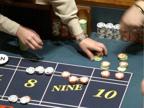 Action at the "craps" table in the River Rock Casino in Richmond.