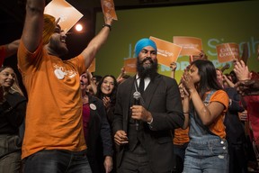 Leadership contender Jagmeet Singh dances on stage with supporters after speaking at the NDP's Leadership Showcase in Hamilton, Ont. on Sunday September 17 , 2017.