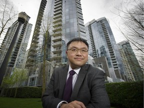 FILE PHOTO Simon Fraser University City Program director Andy Yan is shown in Coal Harbour, where he has documented significant numbers of vacant condo units. Yan says B.C.'s real estate industry is building "too many Ferraris, and not enough Hondas," and the result is "a systemic failure of the housing market here in Metro Vancouver to meet local incomes."