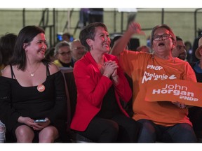 Vancouver-Mount Pleasant MLA Melanie Mark smiles while watching election results at NDP headquarters with supporters in Vancouver on May 9. Mark is now B.C.'s Minister of Advanced Education.