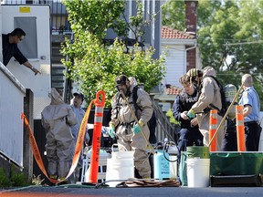 Vancouver police and fire department hazardous materials section investigate a meth lab in the 2900-block East 15th Avenue on June 15, 2012.  Drug and firearm charges against two people have been dismissed as a result of police misconduct during the raid.