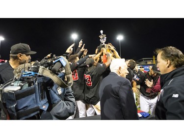 The Vancouver Canadians celebrate after their Northwest League series win over the Eugene Emeralds.