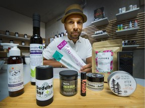 Owner Jeremy Jacob with various products at The Village Dispensary in Vancouver.