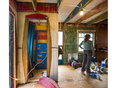 Jeremy and Sus Borsos with the 'Blue cabin' they're renovating.