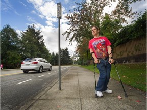 Neil Matheson at a bus stop in Surrey B.C., September 19, 2017. Matheson has cerebral palsy and is an advocate for others with disabilities. He uses transit to get around and has a disability bus pass. He is more fortunate than others in that he has a job to supplement his income, but he knows many who were hit hard by the previous government's actions on the bus passes.