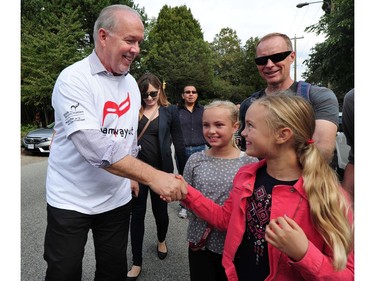 BC Premier John Horgan in action as tens of thousands of people take to the streets as The City of Vancouver, Reconciliation Canada, the Government of Canada and Vancouver Board of Parks and Recreation host the second annual Walk for Reconciliation in Vancouver, BC., September 24, 2017.