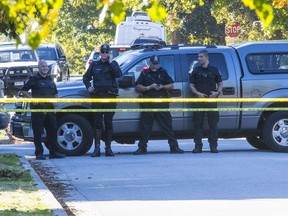 Vancouver Police are pictured at the scene of a double homicide in a Marpole home on Wednesday, Sept. 27, 2017.