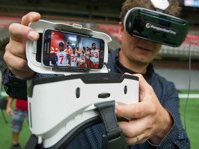 B.C. Lions unveiled a new innovation in virtual sports with the launch of the BC Lions EXP smartphone app at B.C. Place stadium in Vancouver. The app is used in conjunction with a set of virtual reality glasses. Pictured is Chris Bedyk, founder of Perspective Films which developed much of the content.