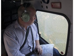 B.C. Premier John Horgan, who viewed the Philpot Road fire by helicopter outside of Kelowna on Monday, believes the federal government ignored oil spill risks when approving the Trans Mountain pipeline.