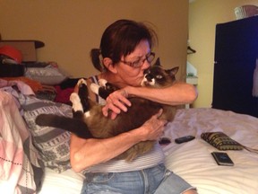 Ester Spye thought her 17-year-old cat Socks had died in the Ashcroft Reserve wildfire, which destroyed her home on the reserve on July 7. However, after disappearing for 52 days the cat turned up at her niece's house. This photos shows Spye and Socks in her Cache Creek motel room.