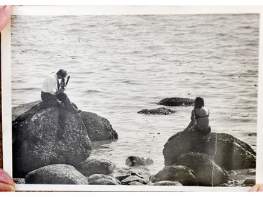 Photo of a Vancouver photographer Ken Honey taking a shot of a model. Honey  took pictures for Playboy including Dorothy Stratten  and other Canadian beauties for Hugh Hefner's Playboy magazine.