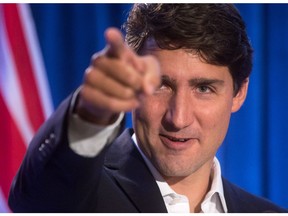 Prime Minister Justin Trudeau gestures while addressing a Liberal caucus retreat in Kelowna, B.C., on Wednesday September 6, 2017.
