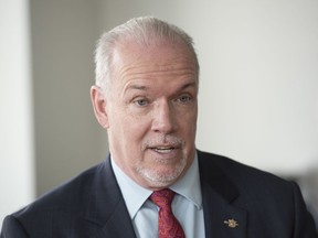 British Columbia Premier John Horgan visits the National Association of Home Builders in Washington, Thursday, July 27, 2017.