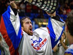 Peterborough Lakers goalie Matt Vinc celebrates winning the Mann Cup in New Westminster on Friday.