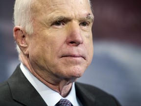 FILE - In this July 27, 2017, file photo, Sen. John McCain, R-Ariz., speaks to reporters on Capitol Hill in Washington. McCain says he won't vote for the Republican bill repealing the Obama health care law. His statement likely deals a fatal blow to the last-gasp GOP measure in a Senate showdown expected next week. (AP Photo/Cliff Owen, file)