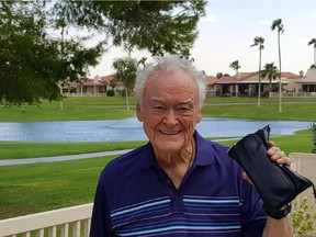 Zach Whaley holds up the billfold he thought he'd lost for good in Victoria on Sept. 8, but a local store manager persevered in tracking down the 85-year-old to give him his wallet back.