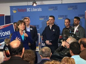 Todd Stone, right,looked on as former B.C. Premier Christy Clark campaigned in Kelowna on April 14, 2017. Stone has entered the B.C. Liberal leadership race.