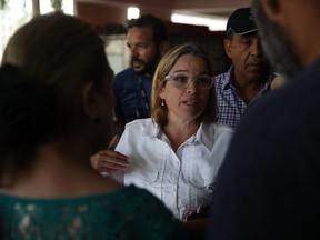 San Juan Mayor Carmen Yulin Cruz deals with an emergency situation where patients at a hospital need to be moved because a generator stopped working in the aftermath of Hurricane Maria on September 30, 2017 in San Juan, Puerto Rico.