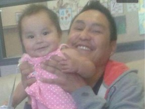 Robert Boucher, 31 was stabbed and killed on Nov. 13, 2015, behind the Ivanhoe Pub. He is shown here holding his infant daughter.