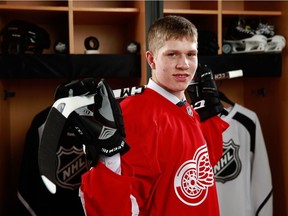 Dennis Cholowski, selected 20th overall by the Detroit Red Wings, poses for a portrait during round one of the 2016 NHL Draft at First Niagara Center on June 24, 2016 in Buffalo, New York.