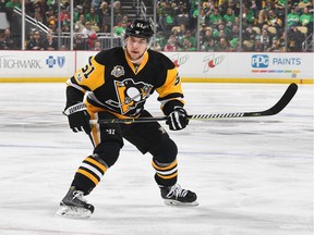 Defenceman Derrick Pouliot has exchanged his Pittsburgh Penguins' uniform for a new Canucks one after Vancouver obtained him in a Tuesday trade for Andrey Pedan.