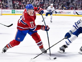 Canadiens' Brendan Gallagher unleashes a shot during Saturday night's overtime loss to the Leafs at the Bell Centre. Gallagher is hoping that his newly shaved head will bring luck to the team.