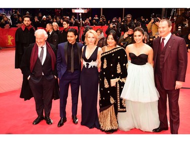 (L-R) Actor Michael Gambon, US actor Manish Dayala, US actress Gillian Anderson British director Gurinder Chadha, Indian actress Huma Qureshi and British actor Hugh Bonneville arrive for the screening of the film 'Viceroys House' in competition at the 67th Berlinale film festival in Berlin on February 12, 2017.
