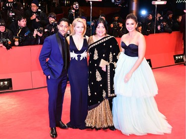 (L-R) US actor Manish Dayala, US actress Gillian Anderson British director Gurinder Chadha amd Indian actress Huma Qureshi arrive for the screening of the film 'Viceroys House' in competition at the 67th Berlinale film festival in Berlin on February 12, 2017.