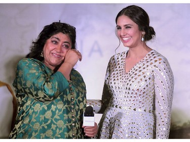 Bollywood actress Huma Qureshi (R) takes part in a promotional event for the forthcoming Hindi film 'Partition 1947' directed by Gurinder Chadha (L) in Mumbai on July 4, 2017.