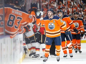 Connor McDavid of the Edmonton Oilers celebrates one of his three goals against the Calgary Flames in the season opener at Rogers Place on Oct. 4, 2017 in Edmonton.