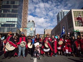 First Nations people wait for the Walk for Reconciliation to begin in Vancouver, B.C., on Sunday September 24, 2017. A high fertility rate and a growing sense of self are fuelling an explosion in the ranks of Indigenous Peoples, according to fresh census numbers that lay bare the demographic challenges facing one of the most vulnerable and poverty-stricken segments in Canada.