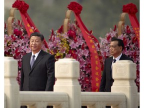China's new strict controls on capital leaving the country appear to be popping Metro Vancouver's high-end real estate bubble. (Photo: Chinese President Xi Jinping, left, and Premier Li Keqiang at recent event in Tiananmen Square in Beijing.)