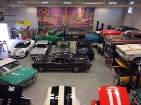 Fire raced through a large garage in Langley on Wednesday, destroying a multimillion-dollar collection of vintage cars, some of which are shown in a recent handout photo. Garry Cassidy spent decades collecting and only in the last year put his collection of 40 vehicles in the new garage.