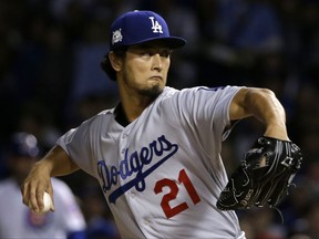 Los Angeles Dodgers starting pitcher Yu Darvish throws during the first inning of Game 3 of the National League Championship Series against the Cubs on Tuesday night in Chicago.