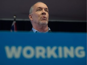 FILE PHOTO - B.C. NDP Leader John Horgan speaks during a post election news conference in Vancouver, B.C., on Wednesday May 10, 2017.